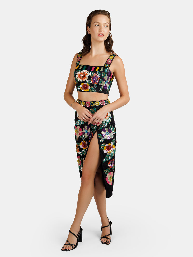 Sequin embellished pencil skirt with colorful flower motifs designed by Maryjane Claverol