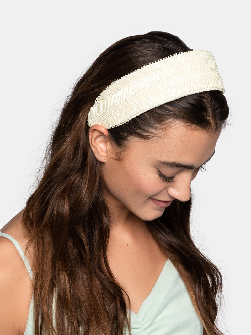 Wide flat base headband with multiple beads designed by Maryjane Claverol.
